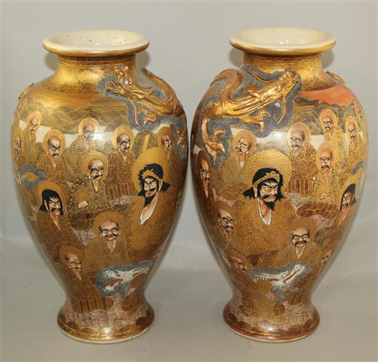 A pair of Japanese Satsuma pottery baluster vases, Meiji period, signed Hodota, 38.5cm